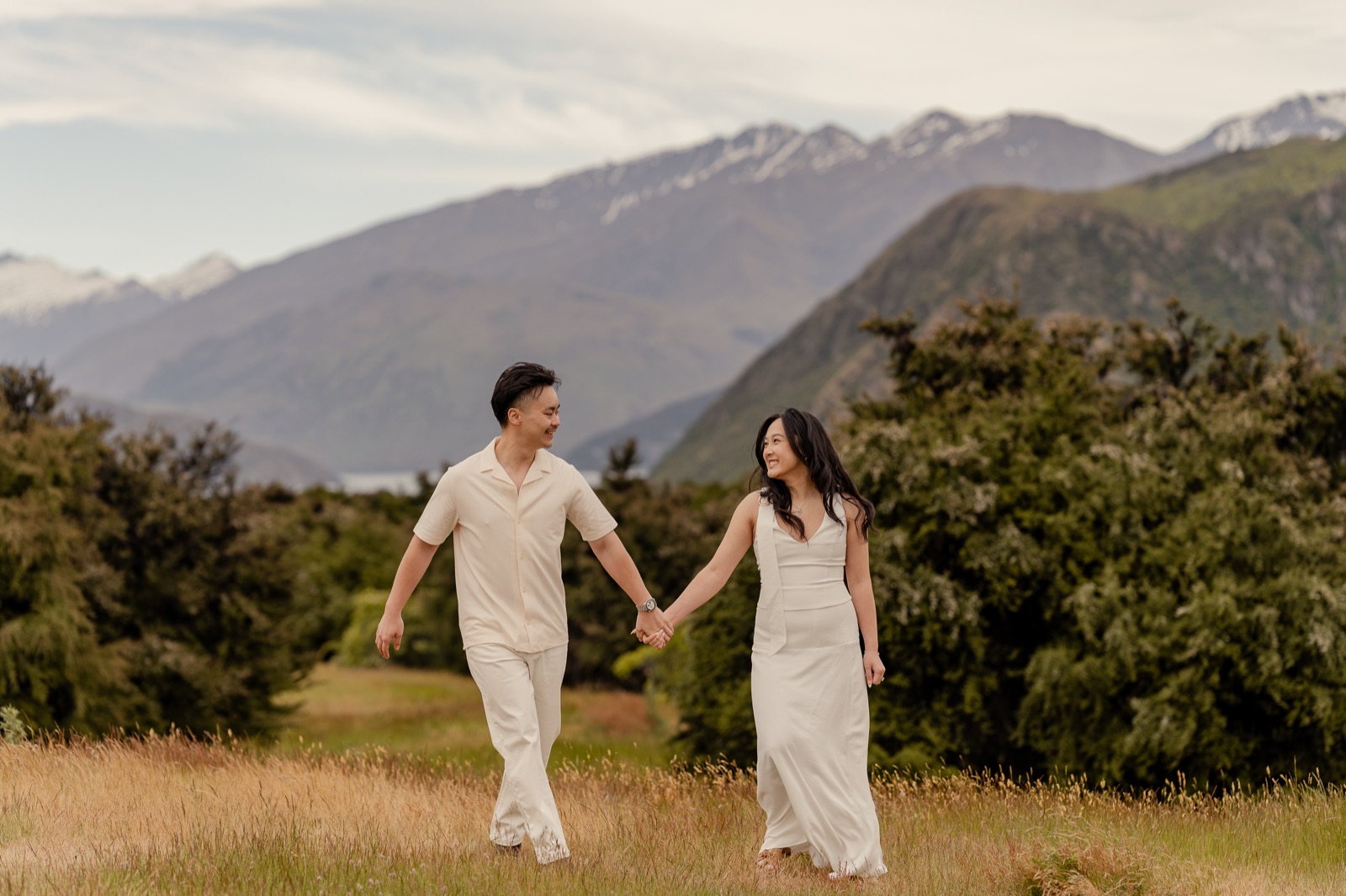 Benjamin and Stephanie walking hand in hand